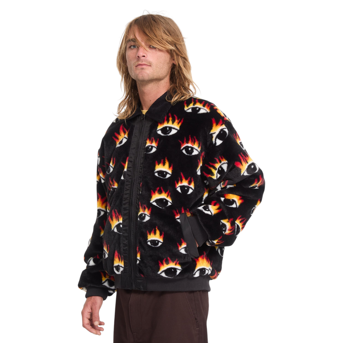 Homme portant la veste bomber réversible Born2ride Volcom Fa Ozzy en nylon noir avec imprimé yeux et flammes