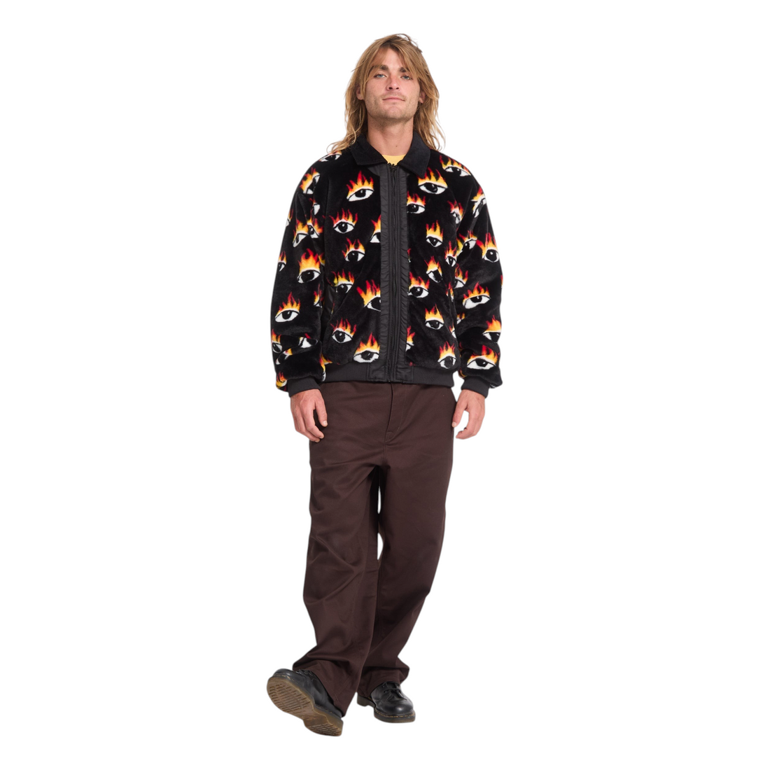 Homme portant la veste bomber réversible Born2ride Volcom Fa Ozzy noire avec imprimé yeux enflammés et col velours