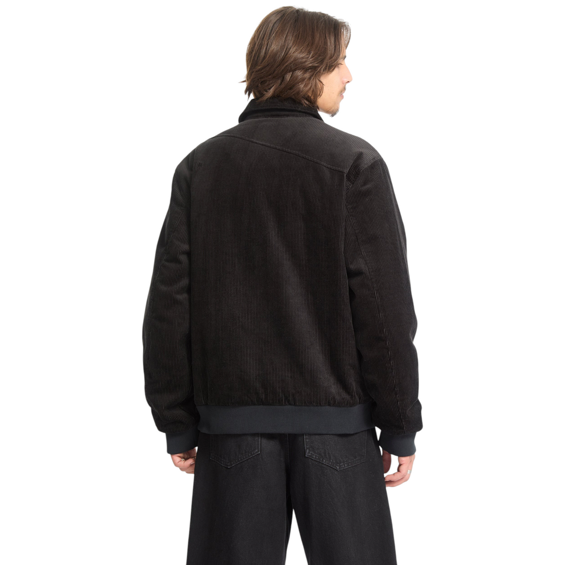 Homme portant la veste Born2ride Volcom Kurtis noire en coton côtelé avec doublure chaude, vue de dos