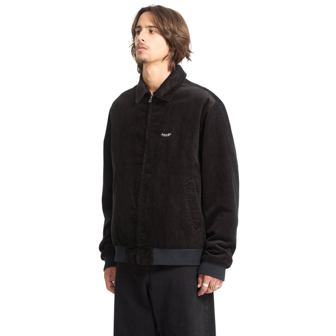 Homme portant la veste Born2ride Volcom Kurtis noire en velours côtelé avec doublure chaude et col classique
