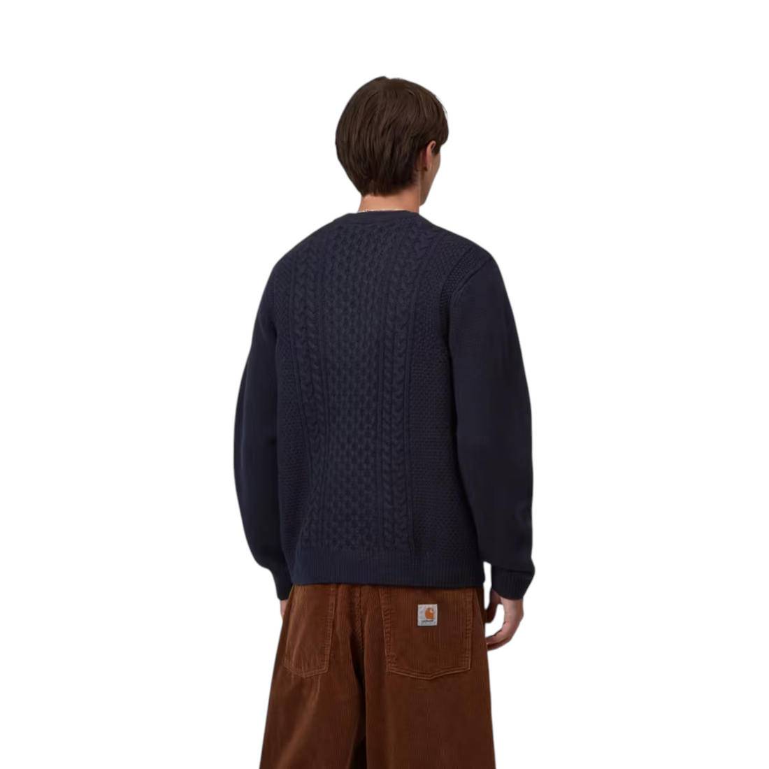 Vue arrière du pull Carhartt WIP Caster en maille torsadée bleu marine porté par un homme chez Born2ride