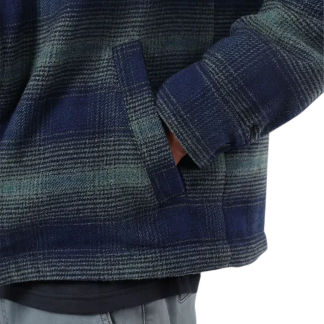 Gros plan sur la poche latérale de la veste Oxbow Ventura-jk en laine mélangée bleu marine et vert chez Born2ride