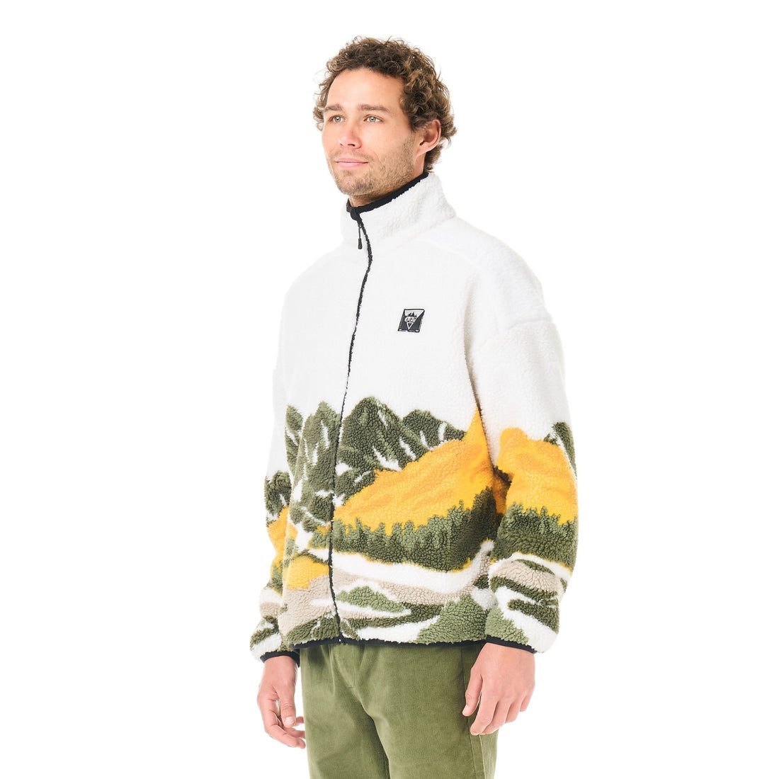 Homme portant la veste polaire Born2ride Picture Organic Hafdals à motif montagne, coloris blanc et vert