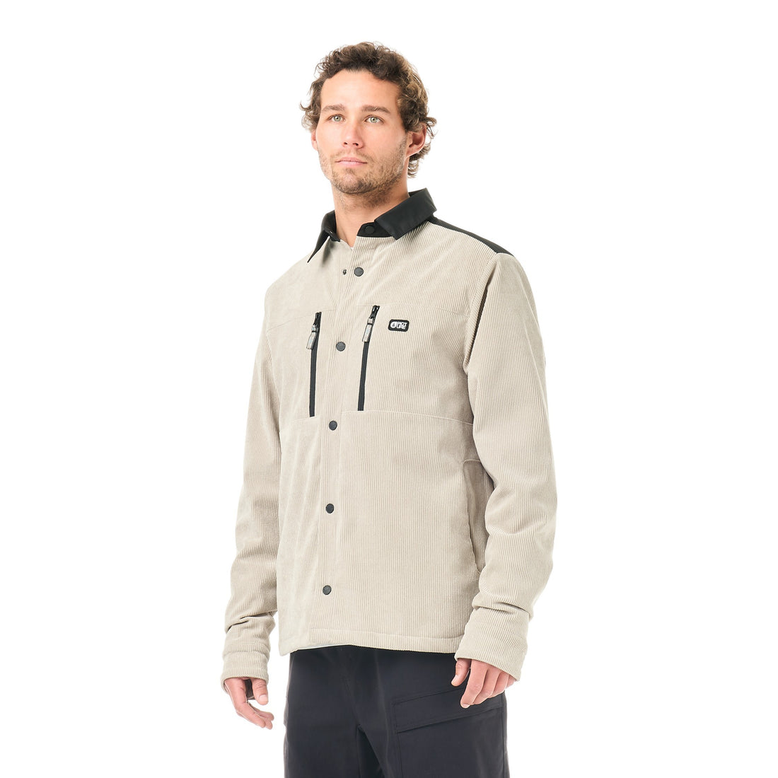 Homme portant la veste Born2ride Picture Organic Bmdji en velours côtelé beige avec doublure sherpa
