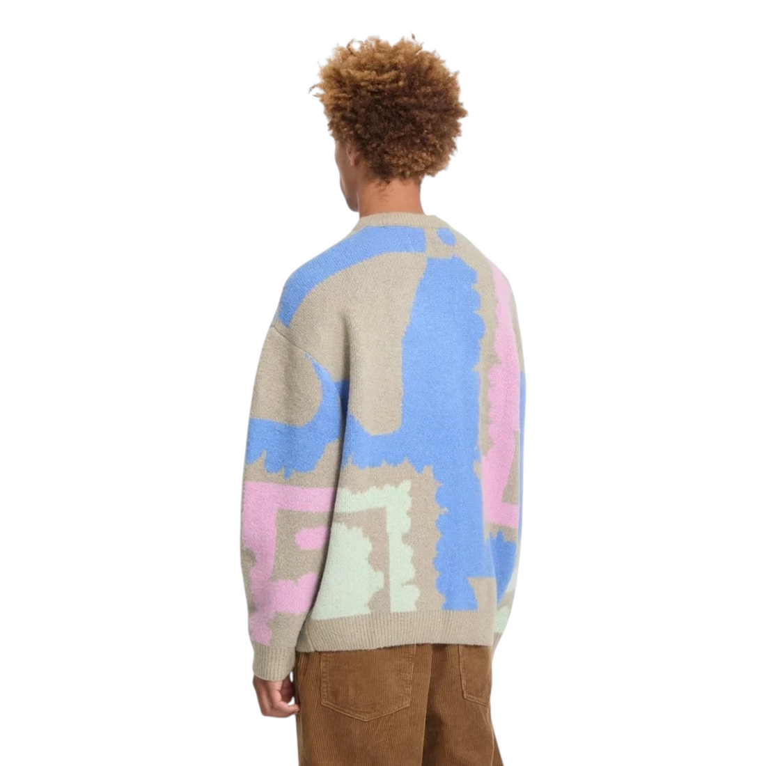 Pull homme Born2ride Volcom Fa Carrau à motifs abstraits colorés sur fond beige, vue de dos