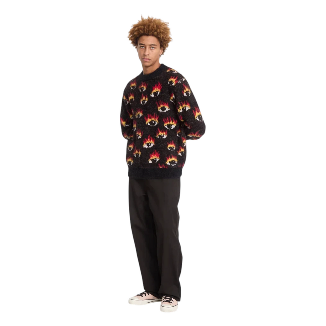 Homme portant un pull Born2ride Volcom noir en nylon et acrylique avec un motif graphique d'yeux enflammés